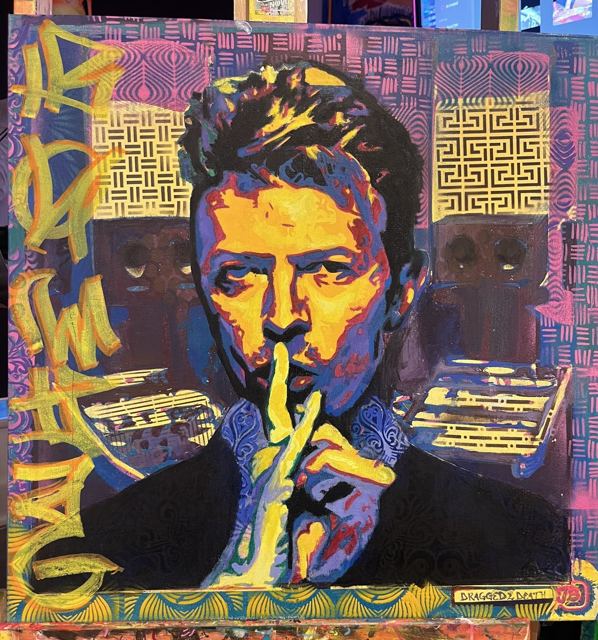 A man raising a finger to his lips, in electric blue, orange and purple pattern